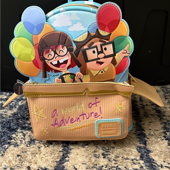 Loungefly Handbags - Loungefly Blue and Brown Adventure Backpack